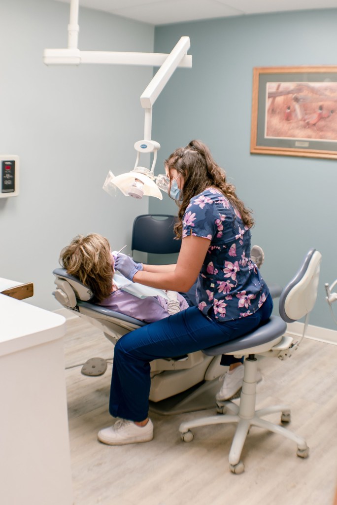 Dr. Kara Sardella performing on a patient